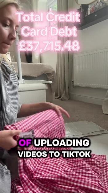 Woman holding a red and white gingham fabric, showing her £37,715.48 credit card debt and asking for help on TikTok.