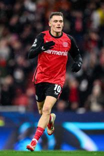 Florian Wirtz of Bayer Leverkusen celebrating after scoring a goal.