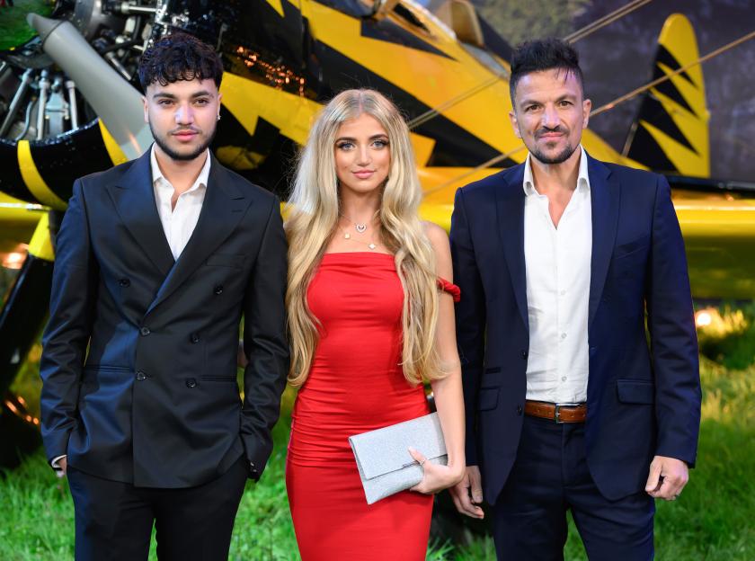 Junior, Princess, and Peter Andre at a movie premiere.