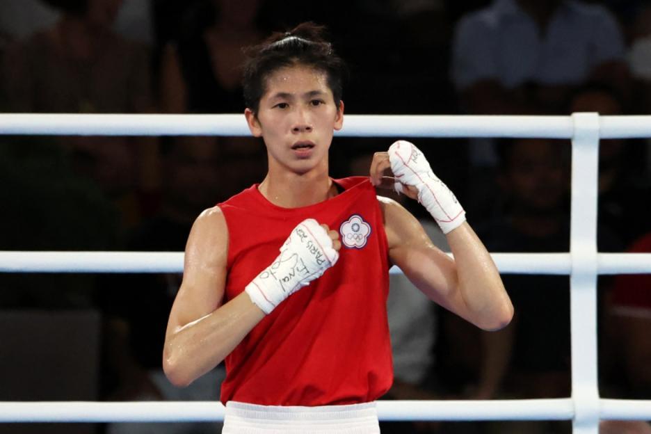 Boxer at Center of Olympic Gender Controversy Triumphs in 94 Seconds After Rule Loophole Leaves Opponent 'Short of Breath'