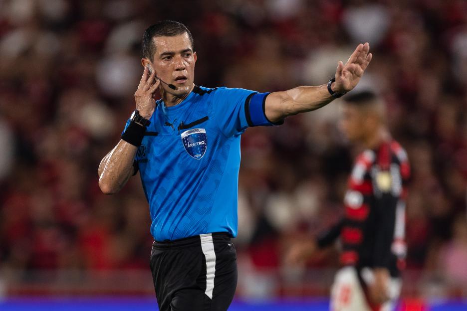 Referee Andres Rojas gestures during a match.