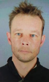 Mugshot of Christian Brueckner, suspect in Madeleine McCann's disappearance.