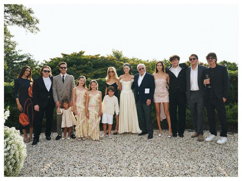Group photo of Brooklyn and Nicola Beckham with family and friends.