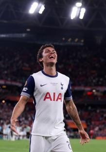 Brennan Johnson of Tottenham Hotspur celebrating a victory.