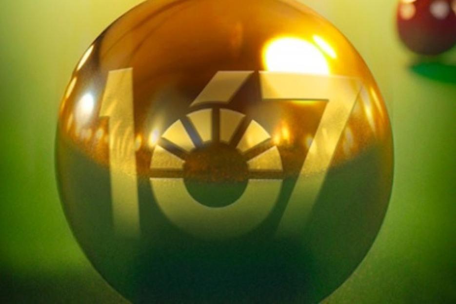 Illustration of a reflective golden snooker ball with "147" written on it.