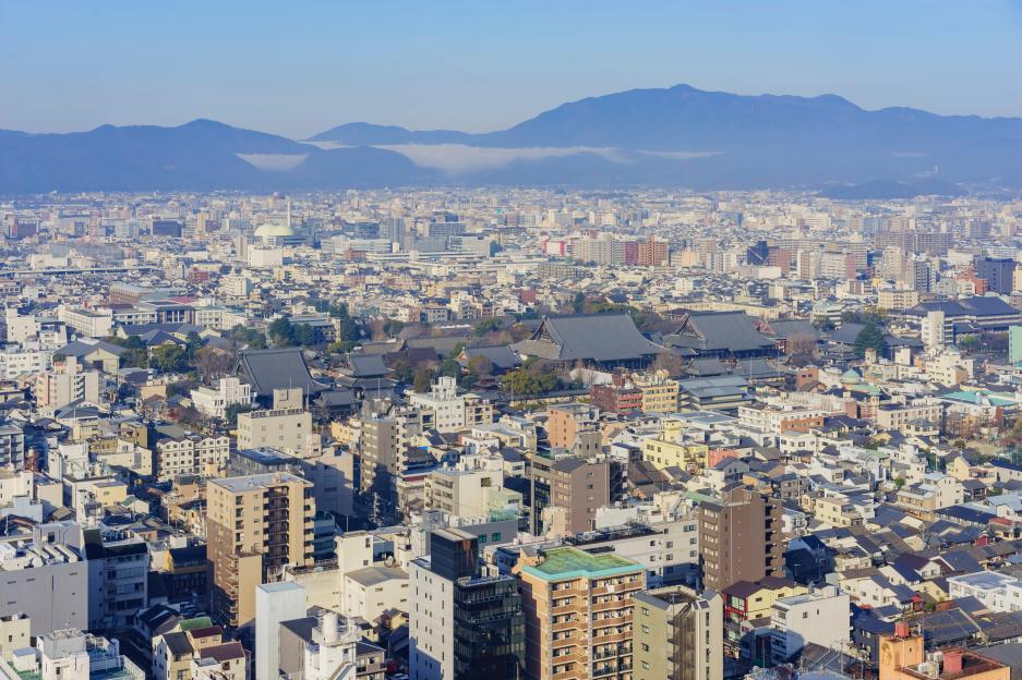 Aerial view of Nishi Honganji temple and Kyoto downtown cityscape.