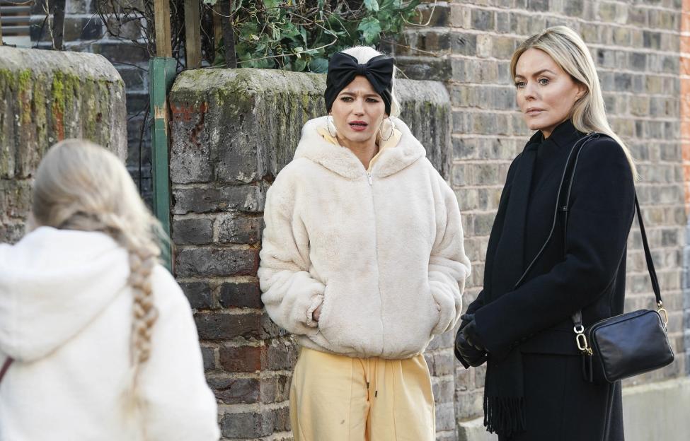 Scene from EastEnders featuring Lola Pearce, Emma, and another woman.