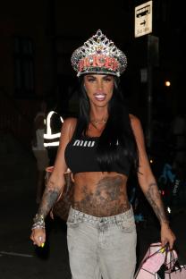 Katie Price leaving a venue wearing a jeweled crown and crop top.