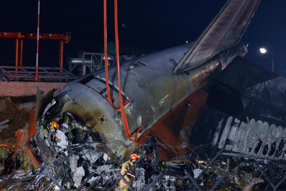The wreckage of Jeju Air Co. Flight 2216 after it crashed and caught fire on an airport runway in South Korea.