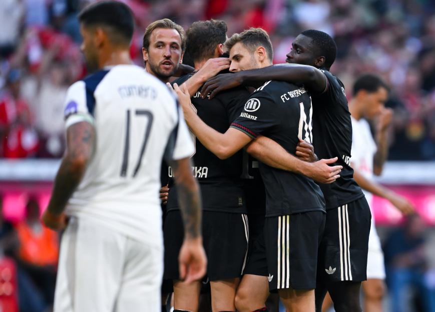 Bayern Munich players celebrating a goal.