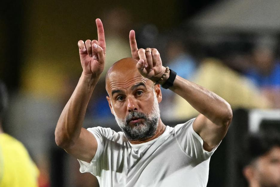 Pep Guardiola coaching a soccer game.