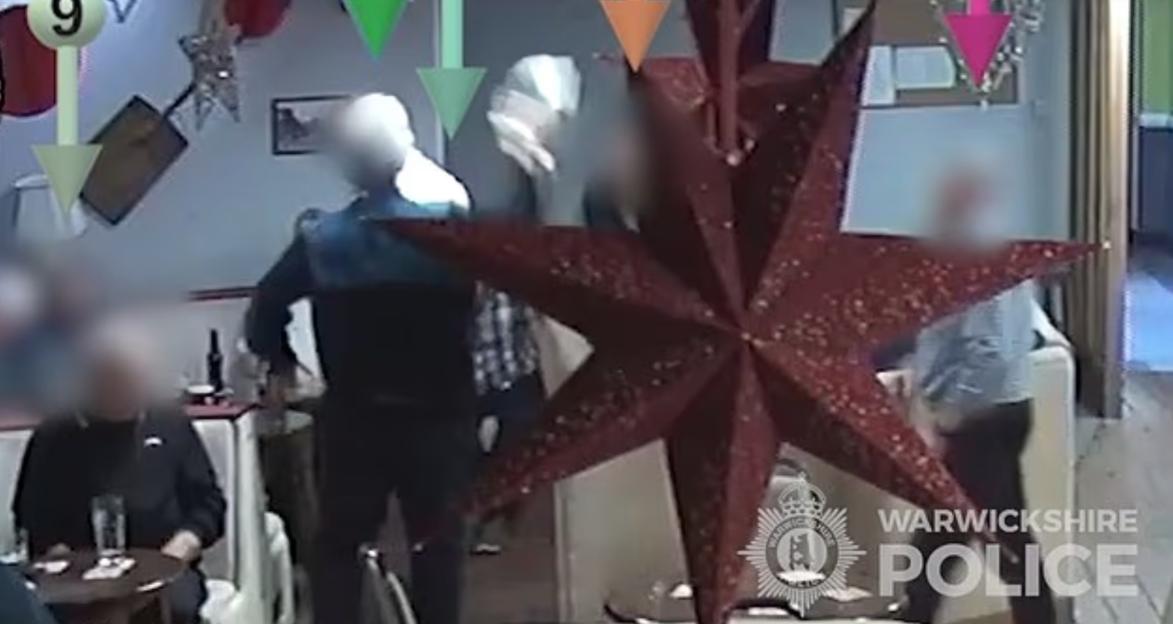 CCTV footage of a bar fight.