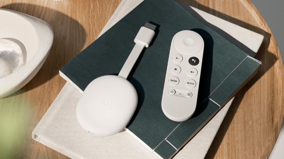 Google TV streaming device and remote.