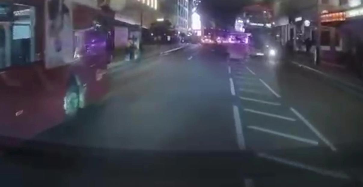 Dashcam footage of a pedicab colliding with a London bus.