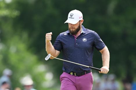 Tyrrell Hatton of England reacts after a putt.