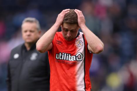Jordan Clark of Luton Town looking dejected after a match.