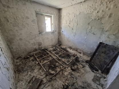 Interior of a destroyed building in Kibbutz Nir Oz, Israel.