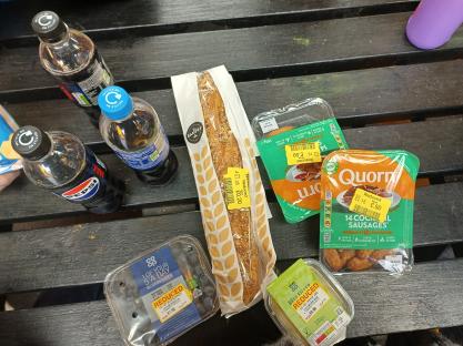 Reduced-price groceries on a table.