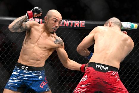 Jose Aldo of Brazil fighting Aiemann Zahabi of Canada in a UFC bantamweight bout.