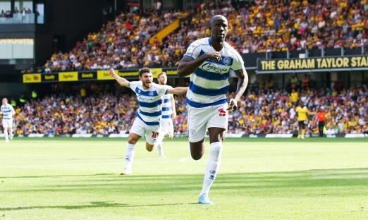 A QPR player celebrates scoring a goal.