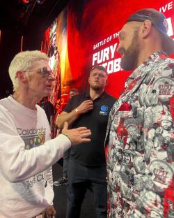 Paul Anderson and Tyson Fury speaking.