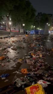 Trafalgar Square littered with trash after a Sunderland fans' party.