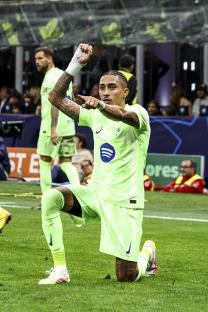 Raphinha of FC Barcelona celebrates scoring a goal.