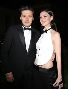 Brooklyn Beckham and Nicola Peltz at a fashion event.
