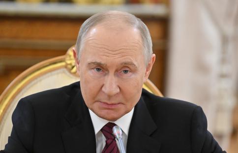 Vladimir Putin at a meeting.