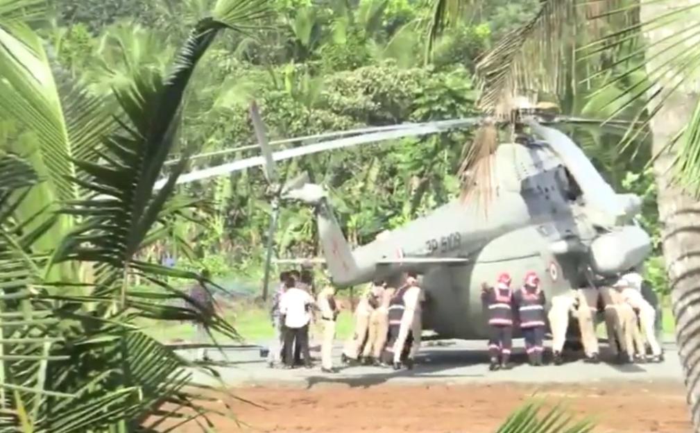 Helicopter on makeshift helipad