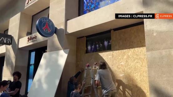 PSG's official club shop boarded up due to looting fears.