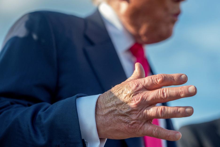 : U.S. President Donald Trump speaks to members of the media upon his arrival from Pennsylvania, at Joint Base Andrews