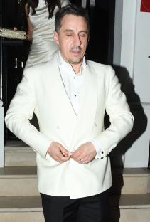 Gary Neville leaving David Beckham's 50th birthday party.