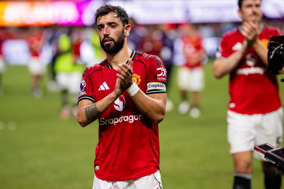 Bruno Fernandes of Manchester United applauding fans.