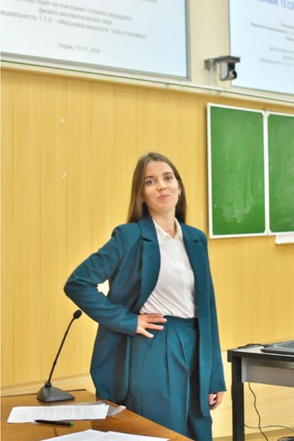 Irina Tyulkina, a junior research fellow, at a presentation.
