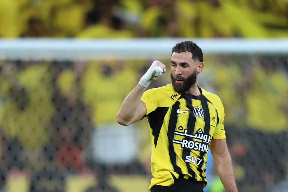 Karim Benzema celebrates scoring a goal.