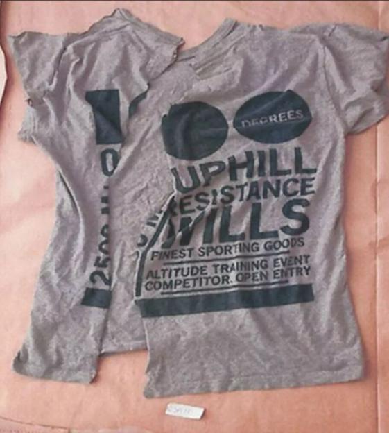 Grey t-shirt with "Uphil Resistance Wills" and other text printed on it.