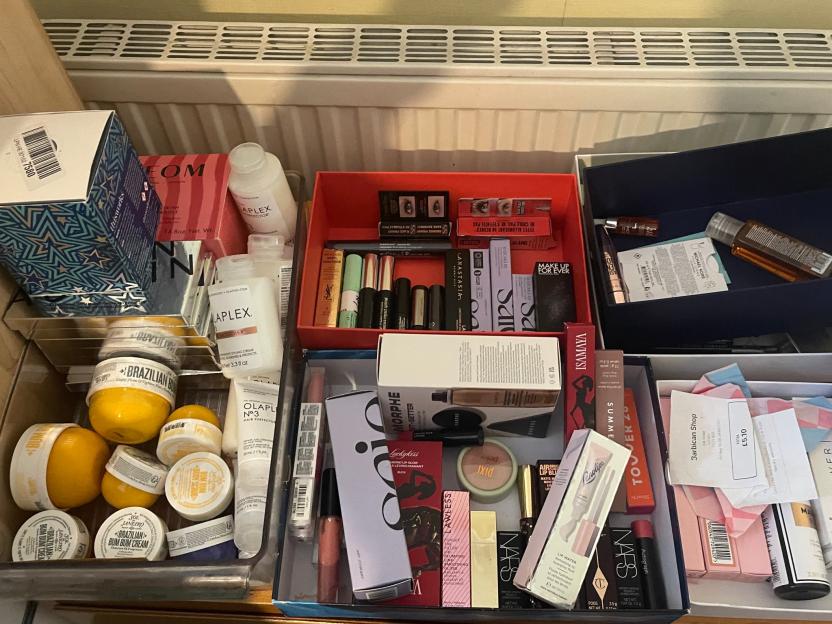 Collection of beauty products in boxes.