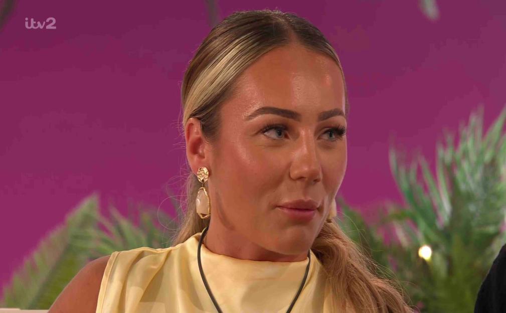 Meg from Love Island looking unhappy.