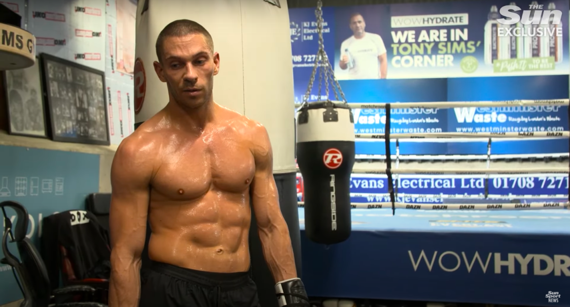 Sweaty boxer in a gym.