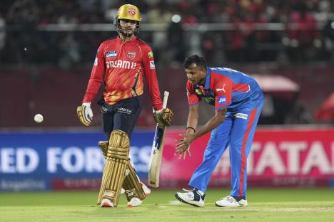 Cricket players T Natarajan and Priyansh Arya during an IPL match.