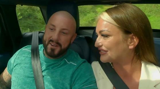 Couple talking in a car.