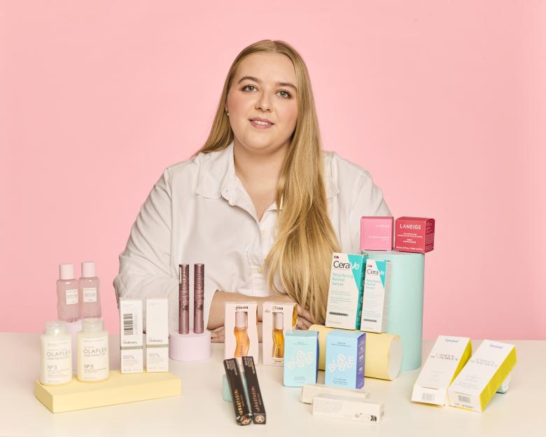 Tara Ledden showcasing various beauty products.