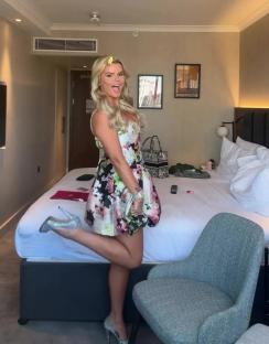 Kerry Katona showing off her weight loss in a floral dress.