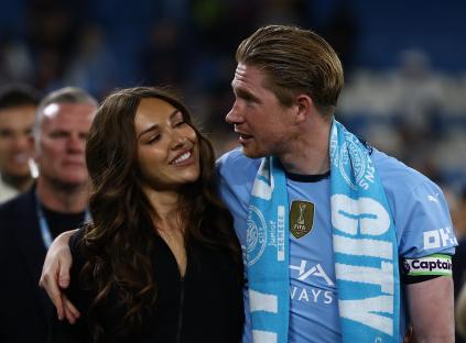 Kevin De Bruyne and his wife Michele Lacroix at a Manchester City match.