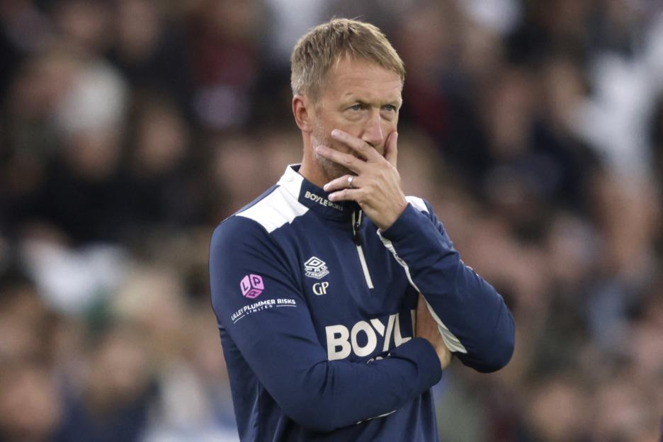 West Ham United's English head coach Graham Potter looking on from the touchline during a football match.