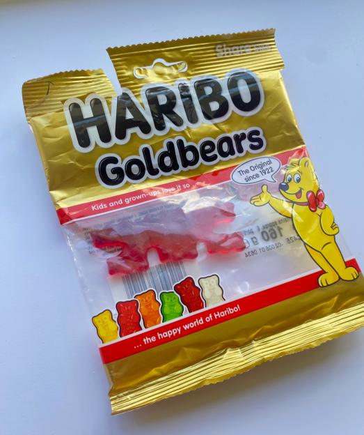 Haribo Goldbears packet with six red gummy bears stuck together.