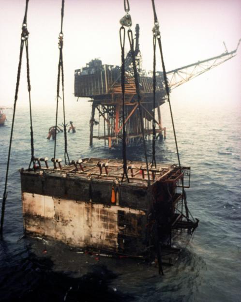 Debris from the Piper Alpha oil rig disaster being lifted from the sea.