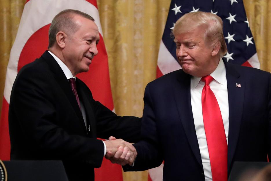 President Donald Trump shakes hands with Turkey's President Recep Tayyip Erdogan.