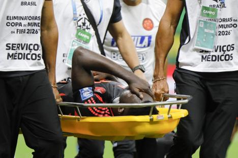 Colombia's defender #23 Davinson Sanchez is stretchered off after colliding with Brazil's goalkeeper #01 Alisson during the 2026 FIFA World Cup South American qualifiers football match between Brazil and Colombia, at the Mane Garrincha stadium in Brasilia, on March 20, 2025. (Photo by Sergio Lima / AFP) (Photo by SERGIO LIMA/AFP via Getty Images)